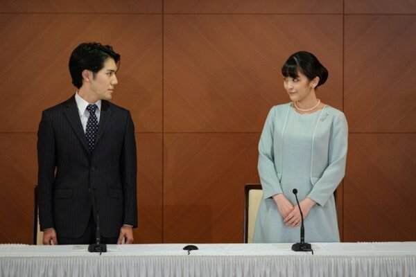 The former Japanese princess and her husband are preparing to go to the US after a `stormy` wedding. 0